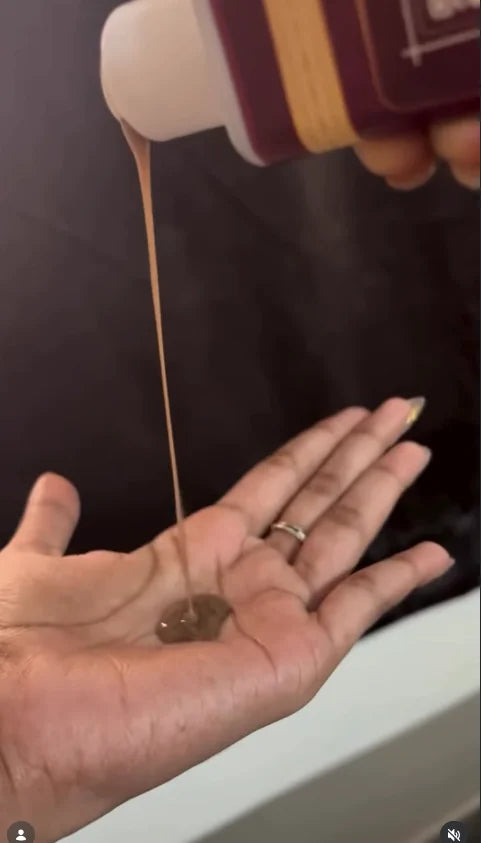 NS Shikakai Shampoo being poured into a hand